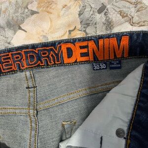 Superdry Men's Slim Jeans in Light Blue with Orange Branding